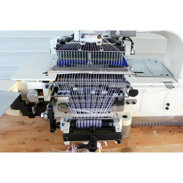 Промышленная 25-ти игольная машина цепного стежка Kansai Special NB1425PQ с возможностью вшивания нитки-резинки в шов